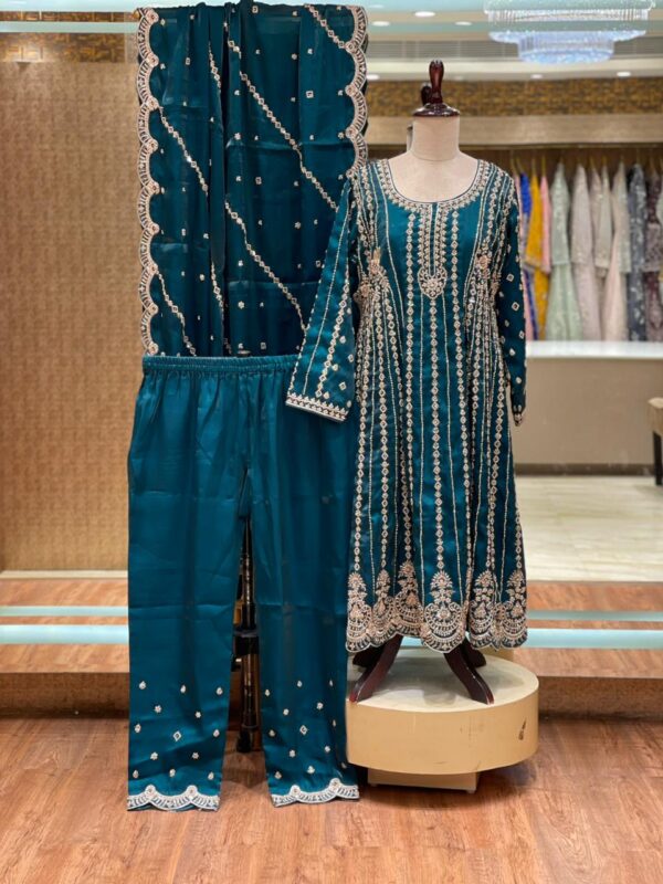 1e9ac9d0-669c-441a-907d-00da09478be3 PEACOCK GREEN ZARDOZI FORMAL